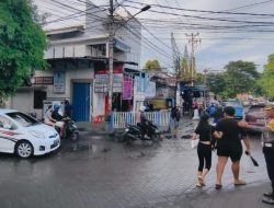 Sat Lantas Polresta Manado Lakukan Pengaturan Lalu Lintas untuk Tingkatkan Keamanan Jalan Raya.