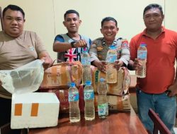 Polsek Pelabuhan Manado Amankan 109 Liter Miras Cap Tikus dalam Operasi Penertiban.